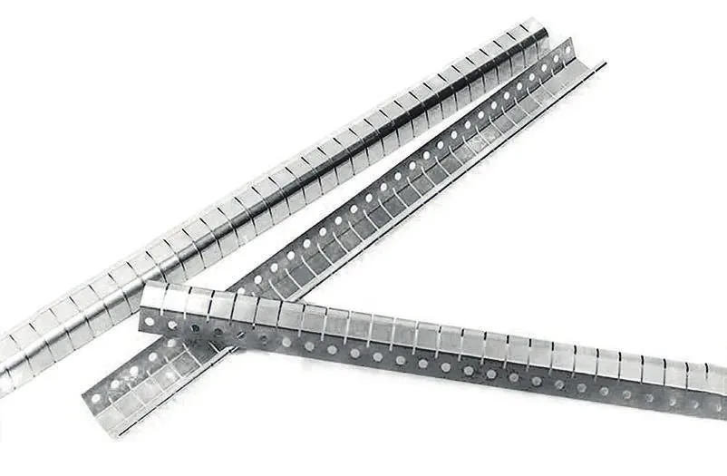 Stamped connector contacts still on their carrier strip.